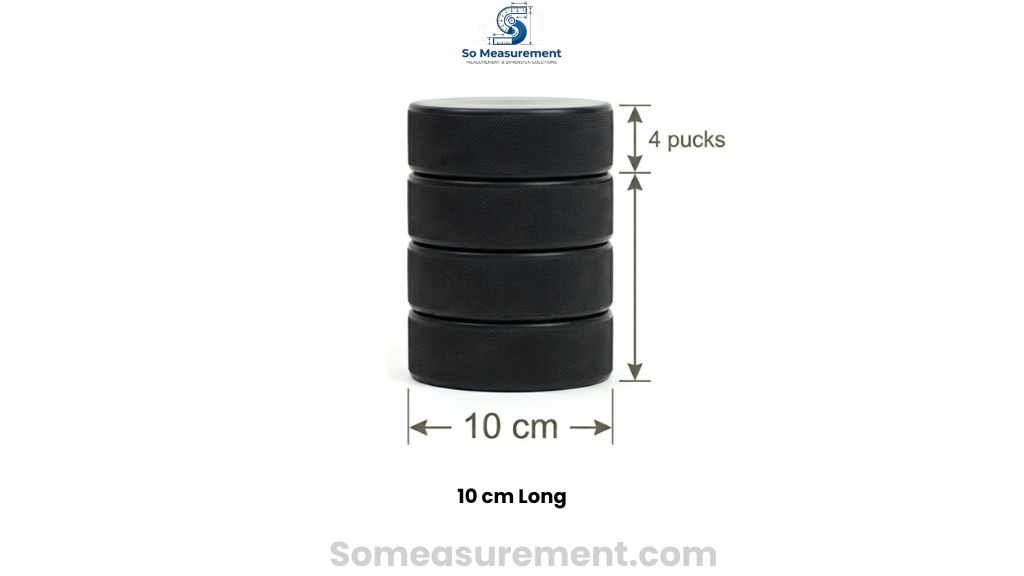 Four Hockey Pucks Stacked That Are 10 cm length